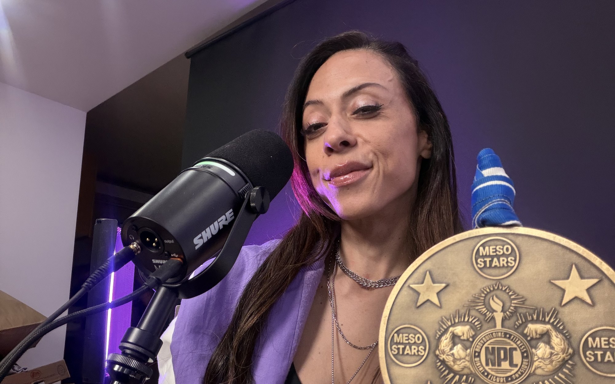 Sayris Athena in her podcast studio